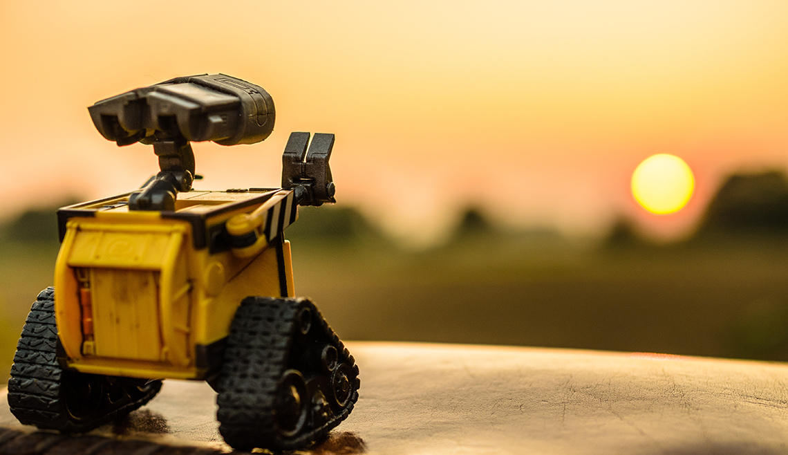 walle toy robot looking out to the sun